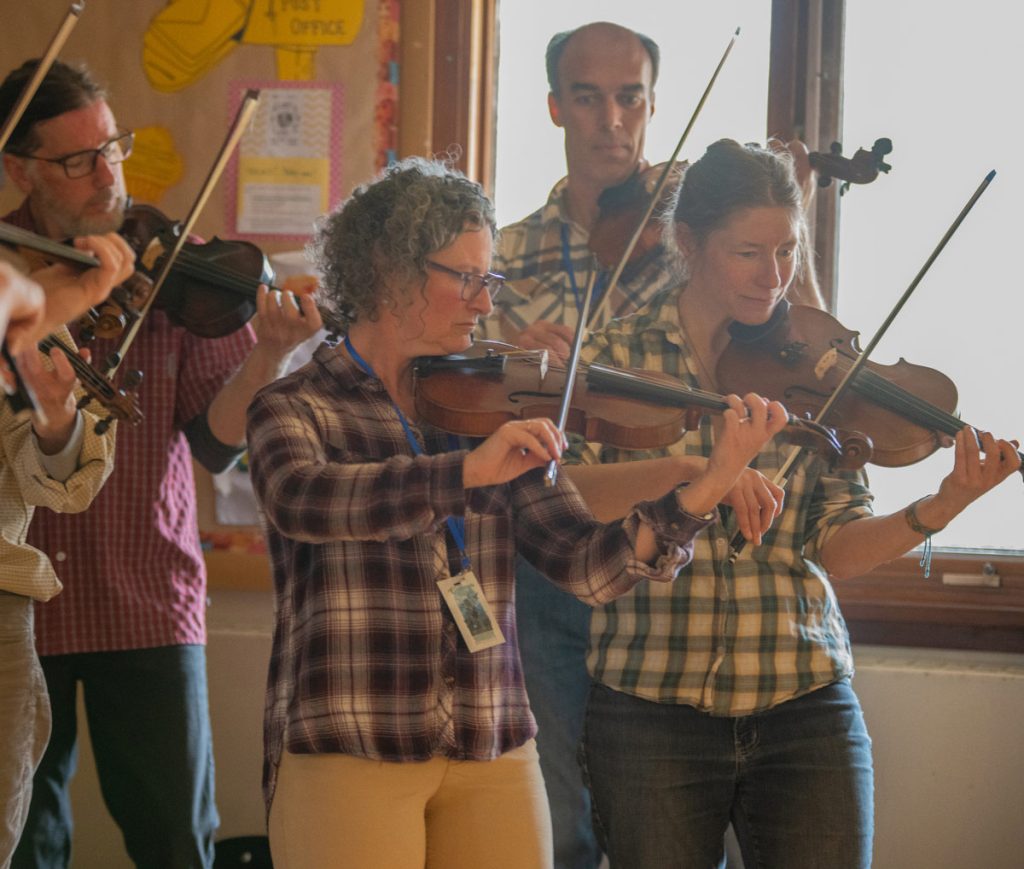The Fiddleheads (a community music group) play in the Fellowship Hall at First Unitarian Church.