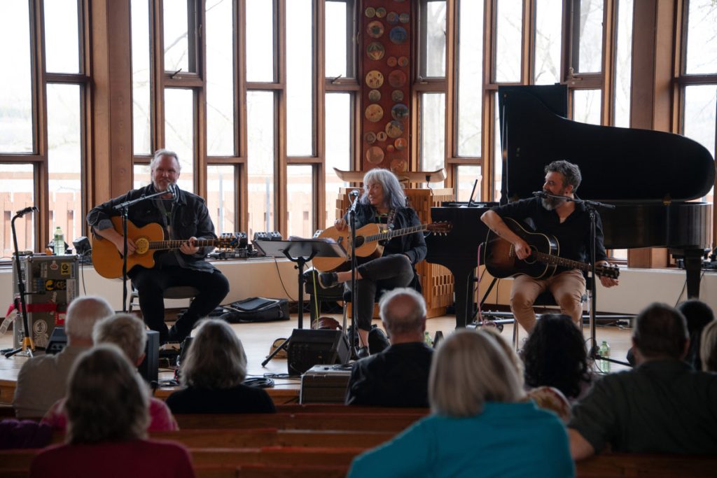 The Songwriter's Circle, with Charlie A'Court, Lynn Miles and Rory Taillon, on stage with three guitars, three big smiles, and a grand piano behind for Lynn to hop over if the mood strikes